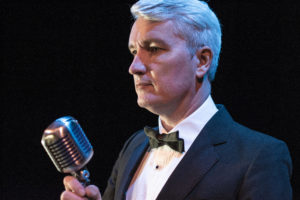 Peter Stanford Swing & Rat Pack Singer With Vintage Microphone Preparing To Sing