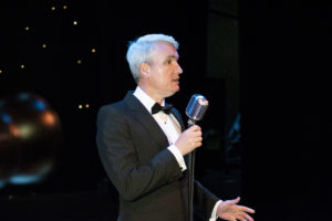 Peter Stanford Swing & Rat Pack Singer With Diffused Lighting In The Background