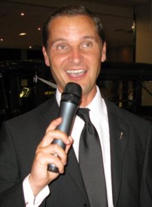 Andy Mack singing swing at a black tie corporate event in London