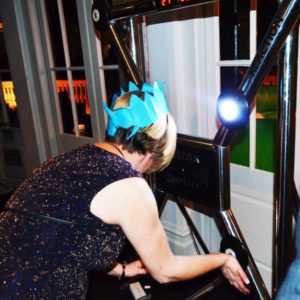 Batak Wall Being Played By Lady In A Paper Hat At Corporate Event