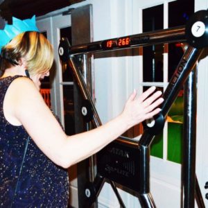 Batak Wall Being Played By Party Goer Wearing A Blue Paper Hat