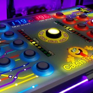 Catch The Light Head To Head Batak Game Showing The Illuminated Play Buttons And Scoreboard