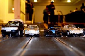 Giant Scalextric Selection of Racing Car Types Lined Up on the Starting Grid