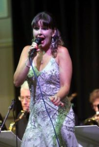 Ruth Faye Singing Live Swing And Big Band Hits With Big Band Musicians In The Background Photo Credit Ron Hill