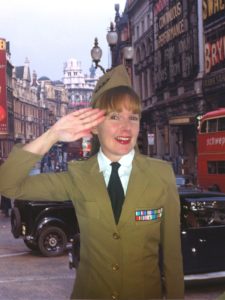 Ruth War Time Singer Saluting In Army Uniform Against A London Backdrop