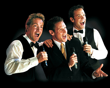 The Three Waiters Singing Waiters Formally Dressed in Dinner Jackets and Formal Waistcoats Performing Live