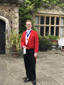 Redcoat Toastmaster & MC Dan in Front of a Wedding Venue