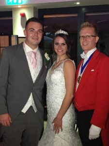 Red Coat Toastmaster & MC Dan Dressed In Formal Uniform With Bride & Groom