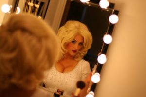 Dolly Parton Tribute Reflected In Make Up Mirror Before A Stage Performance