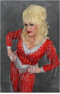 Dolly Parton Tribute In Red Sequinned Jump Suit