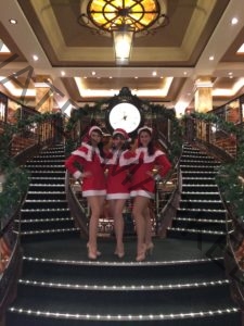 The Patriot Girls Christmas Outfits Posing On A Grand Staircase