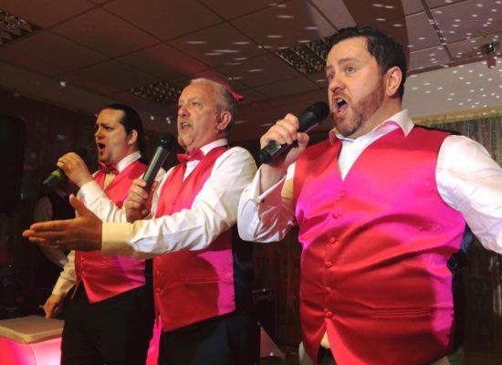 Pink Waiters Surprise Singing Waiters In Pink Waistcoats
