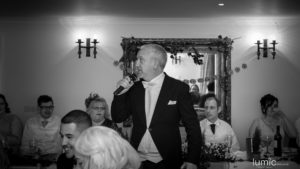 Singing Master Of Ceremonies Performing At Wedding Reception
