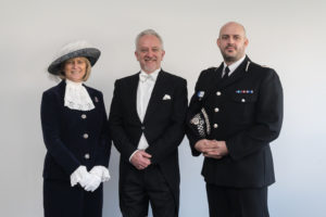 Singing Master Of Ceremonies With Civil Dignitaries Following An Award Presentation