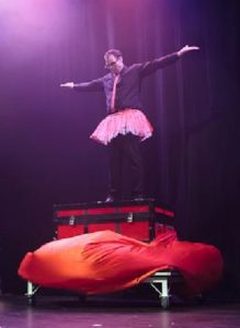 Slightly Unusual Stage Illusionists Sub Trunk With Magician Wearing A Pink Tutu