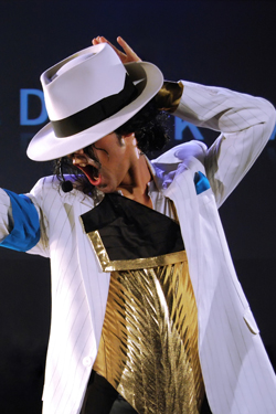Michael Jackson Lookalike Poses In White and Gold Smooth Criminal Costume