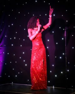 Diana Ross Tribute Act In A Stunning Red Gown