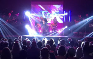 George Michael Tribute On Stage In Front Of A Packed Crowd