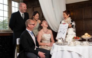 Soozi Caricaturist With Wedding Guests