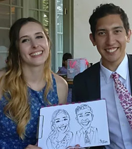 Steve Caricaturist Smiling Couple Proudly Showing Off Their Caricatures