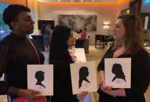Steve Silhouette Cutter Three Ladies Displaying Their Silhouette Portraits