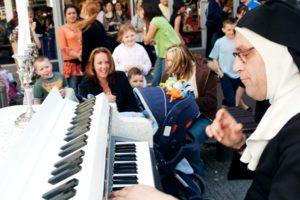 Musical Ruth The Nutty Nun Entertaining The Crowds On Her Magical Mobile Piano