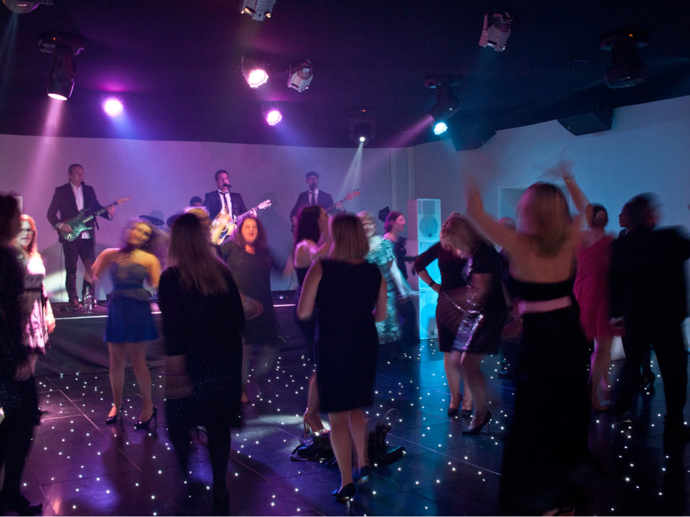 The Dukes Party Band Performing Live At A Wedding With Guests Dancing