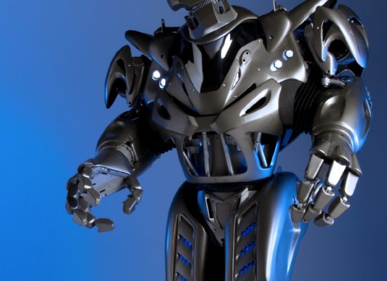 Titan The Robot Against A Blue Background