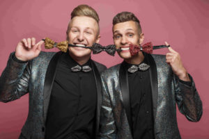 The Bowtie Guys Vocal Duo Posing With A String Of Bow Ties First And Foremost Entertainment Ltd
