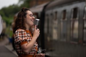Mitzi Metford vintage singer preforming at the station